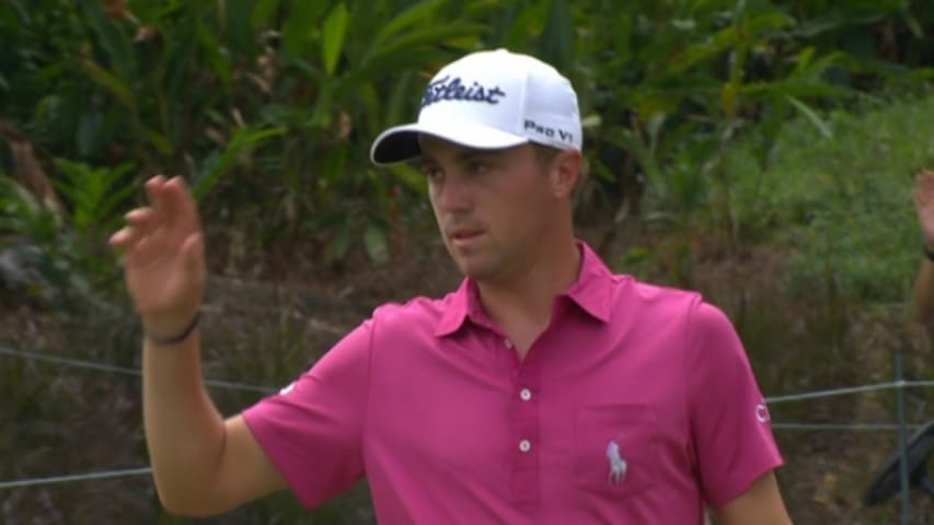 Justin Thomas rolls the rock home on No. 17 at CIMB