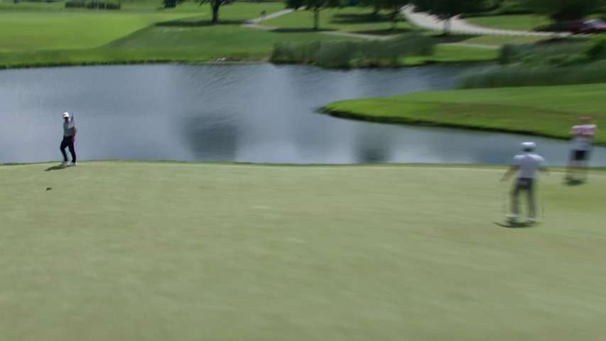 Chan Kim sinks a 43-foot birdie putt on No. 15 at ISCO Championship