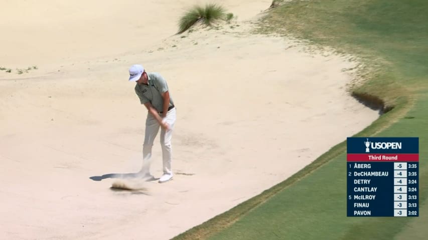 J.T. Poston dunks his bunker shot to save par at the U.S. Open