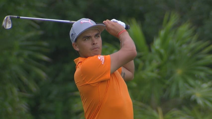 Rickie Fowler walks in his 12-footer at OHL Classic