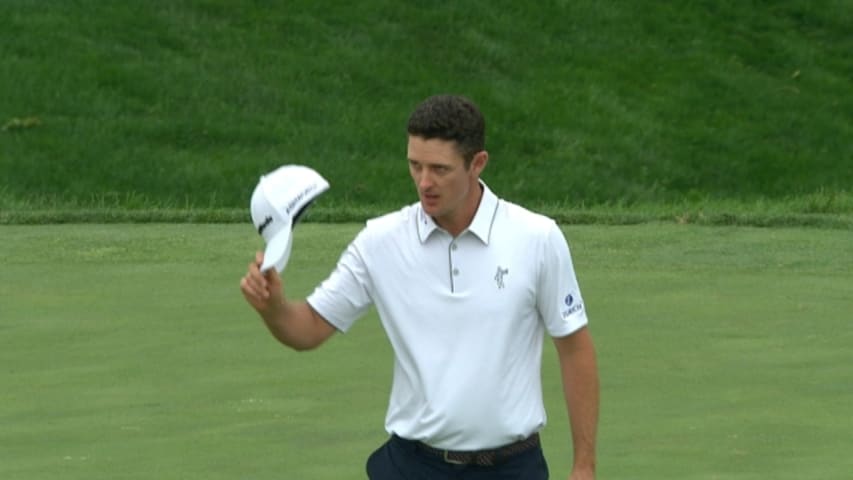 Justin Rose holes a clutch 19-foot par putt in a playoff at the Memorial