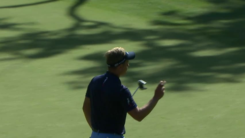 Luke Donald knocks it in tight on No. 14 at RBC Heritage