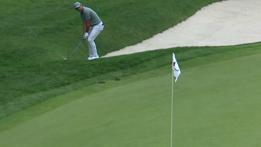 Jason Day finishes with a hole-out birdie at Travelers