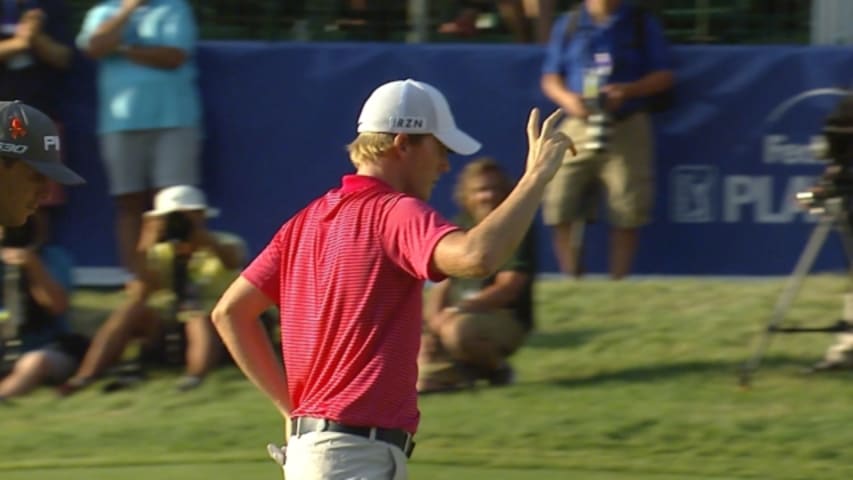 Russell Henley holes lengthy birdie putt on the 72nd hole at Deutsche Bank