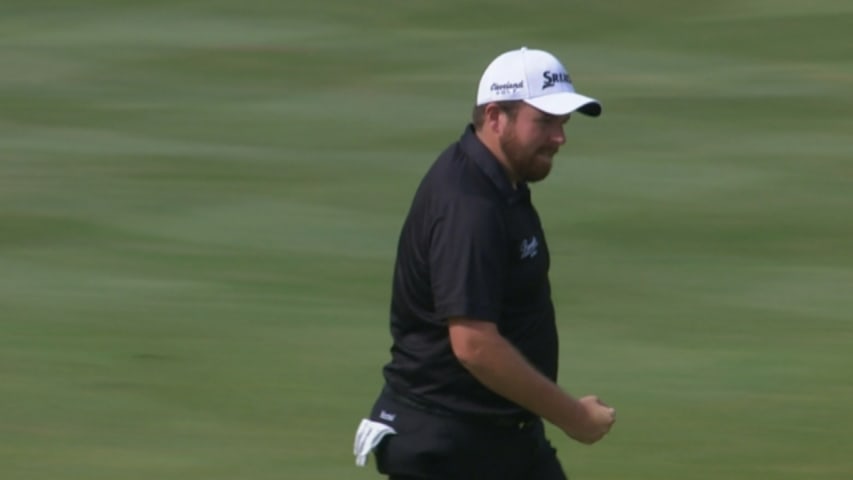 Shane Lowry converts his par save from 17 feet at Bridgestone