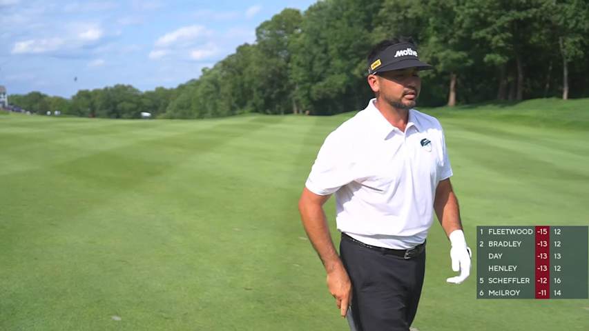 Jason Day sinks a 21-foot birdie putt on No. 14 at Travelers