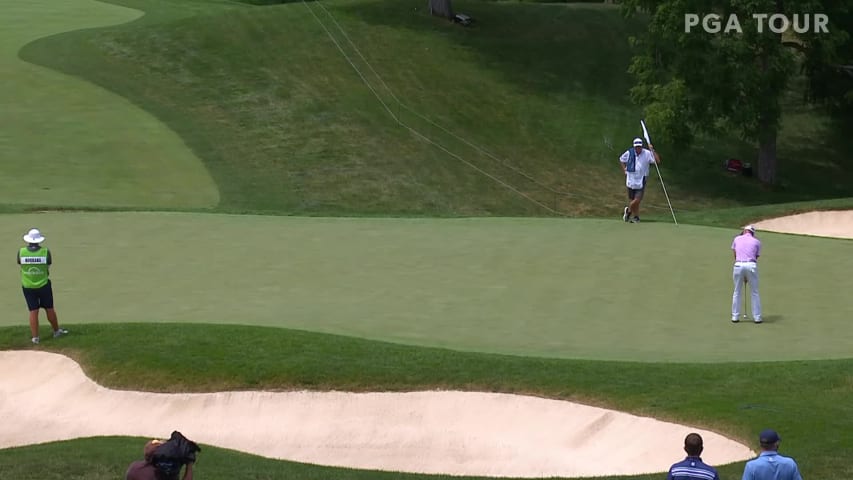 Justin Thomas sinks a 50-foot birdie on the first playoff hole at Workday