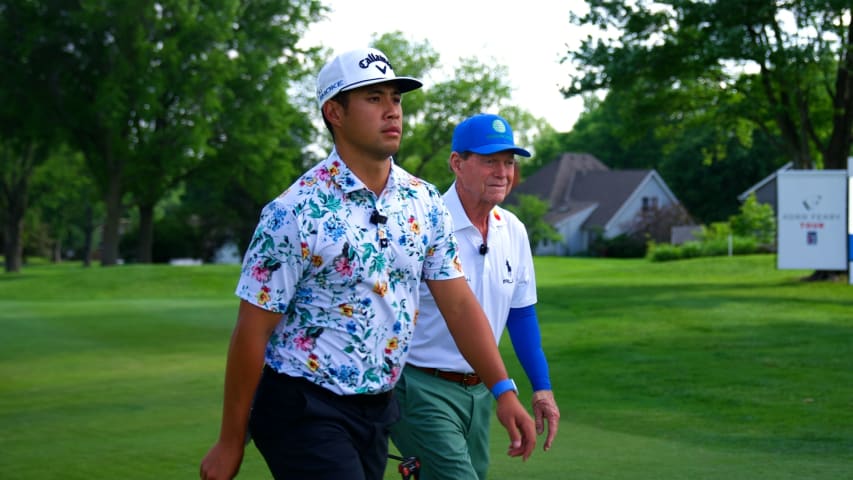 Isaiah Salinda plays the 18th hole with Tom Watson at the AdventHealth Championship