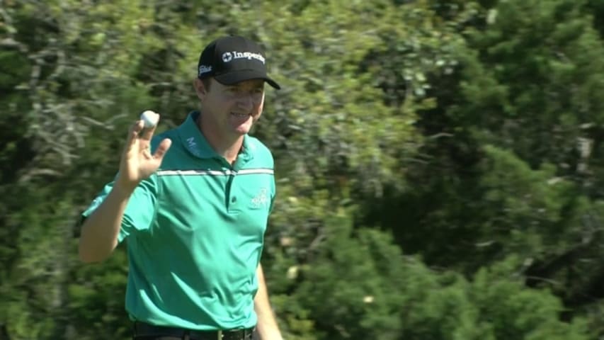 Jimmy Walker runs in an 18-foot birdie putt on No. 17 at Valero