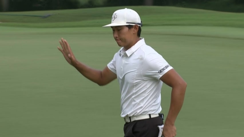 Whee Kim rolls in his 13-foot putt for birdie at Barbasol