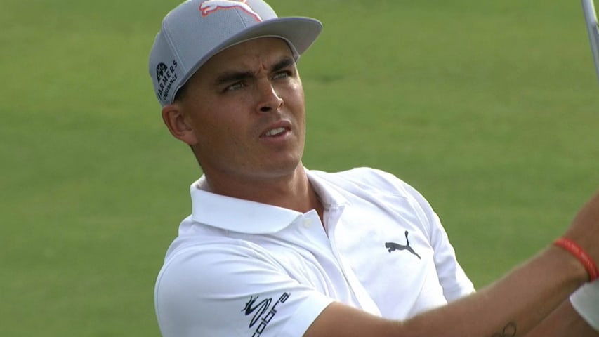 Rickie Fowler's birdie putt drops in the side door at BMW 