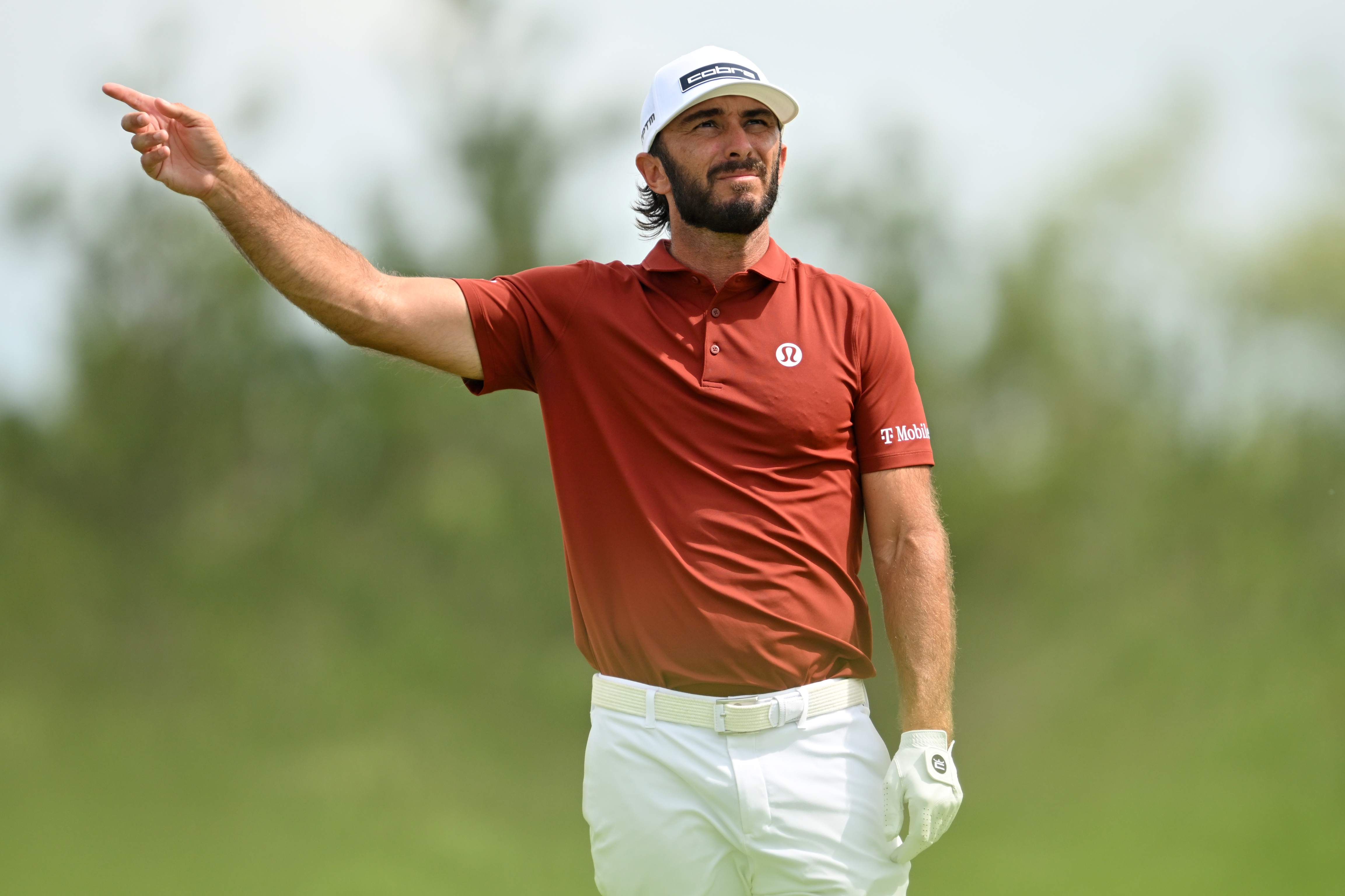 Max Homa addressing the ball with focus during a high-stakes PGA Tour appearance.