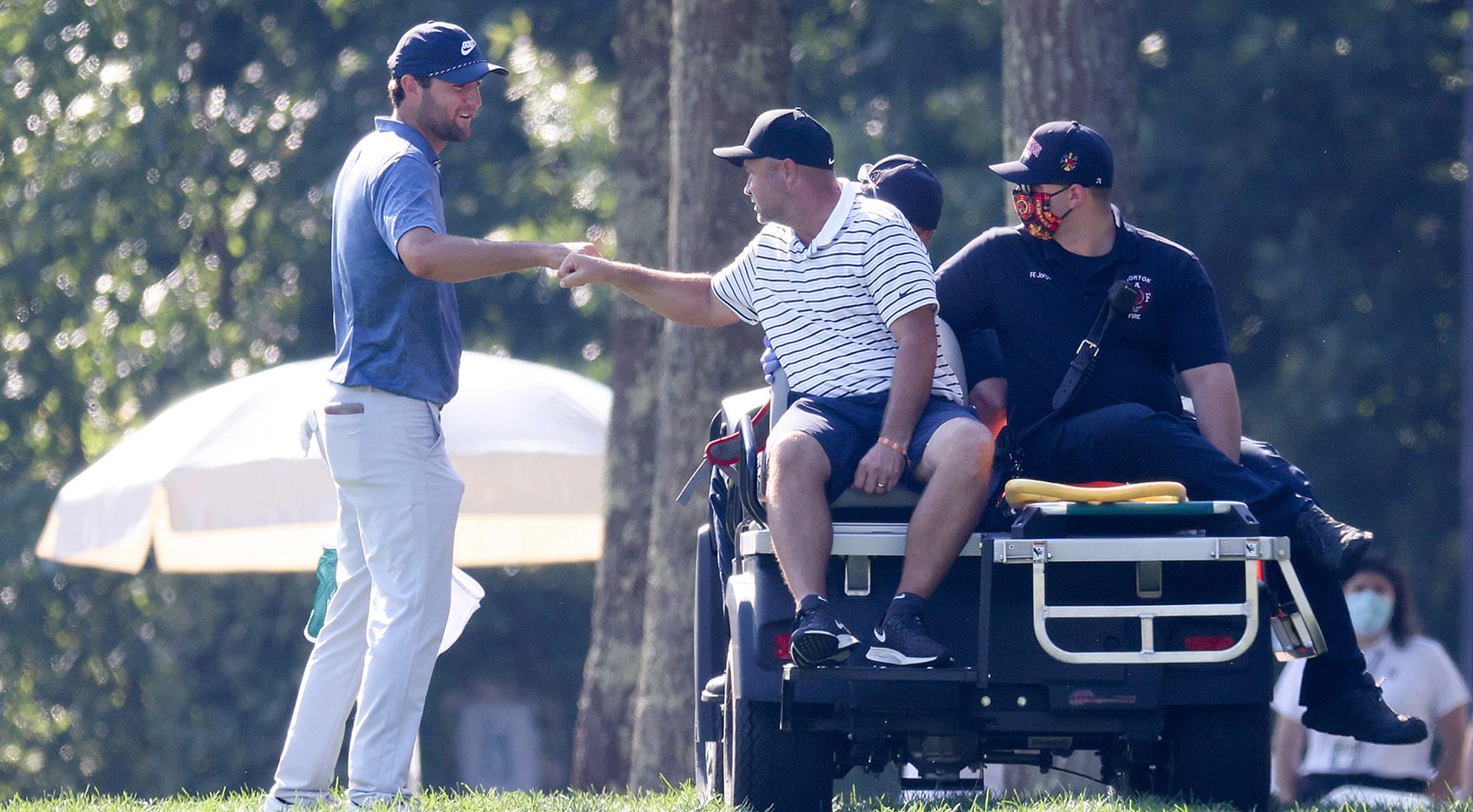 Scottie Scheffler's caddie goes down with injury late on Sunday PGA TOUR