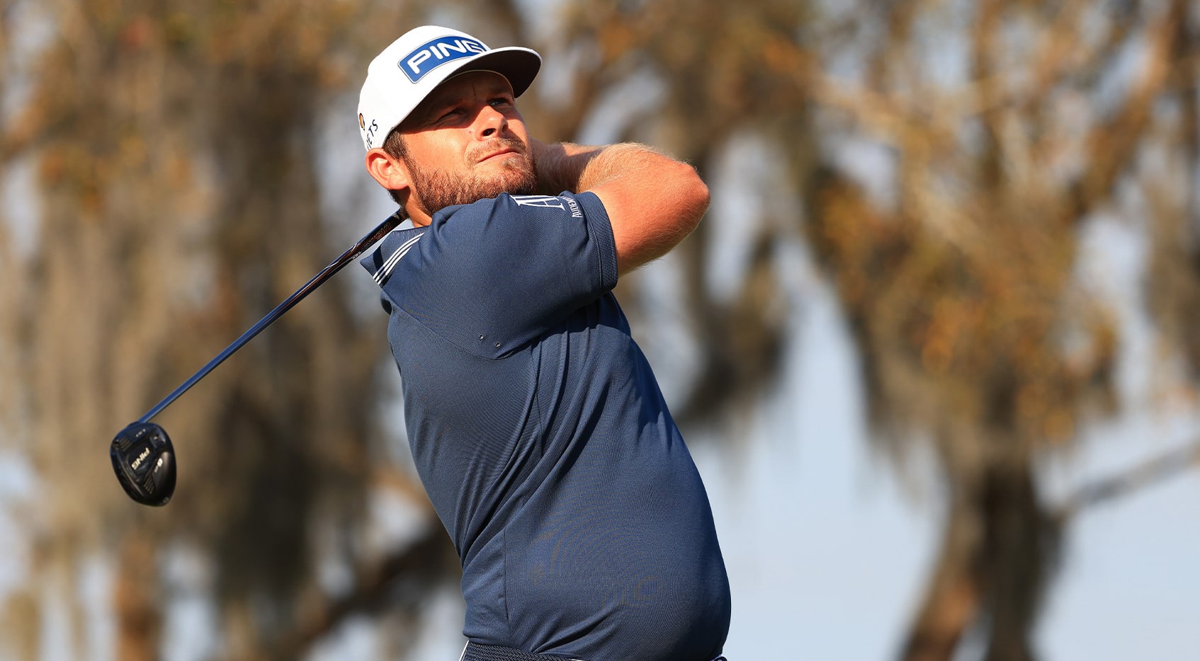 Defending champion Tyrrell Hatton continues charging up leaderboard at