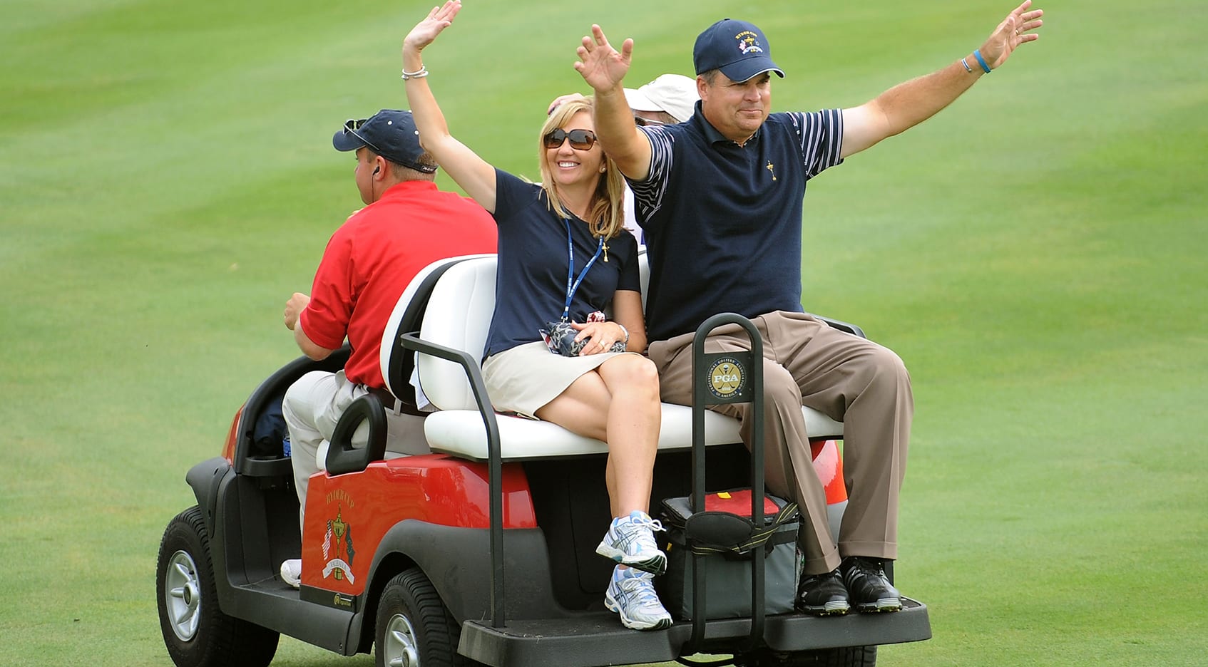Kenny Perry of the USA team and his wife Sandy ride on a cart during the 2008 Ryder Cup at Valhalla Golf Club. (Harry How/Getty Images)