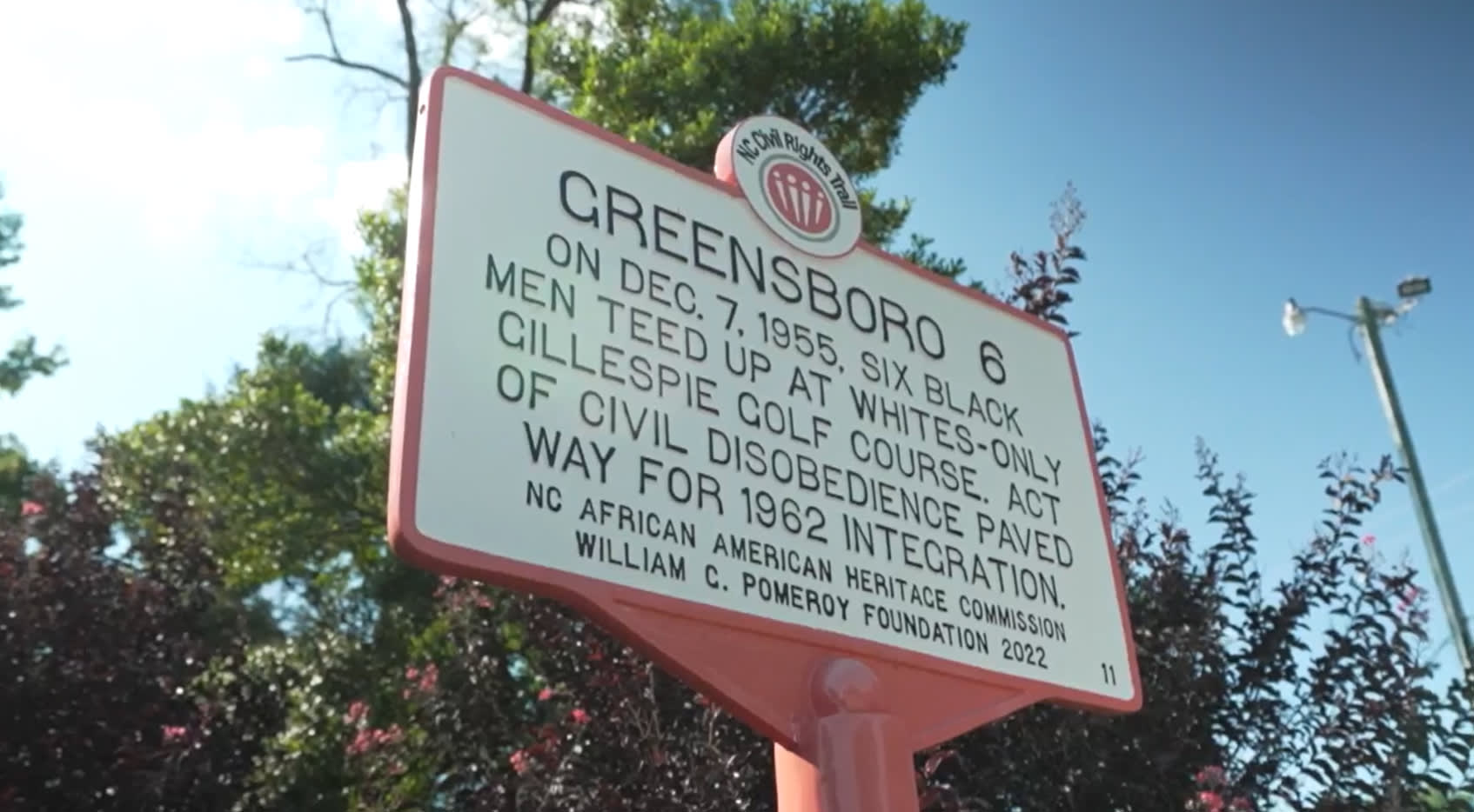 A plaque commemorating the Greensboro Six at Gillespie Golf Course. (PGA TOUR)