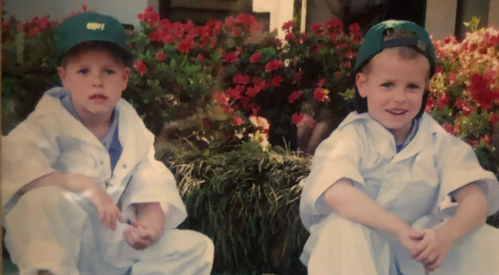 The Coody twins served as co-caddies for their grandpa Charles at the 2006 Par 3 Contest. (Courtesy of Coody family)