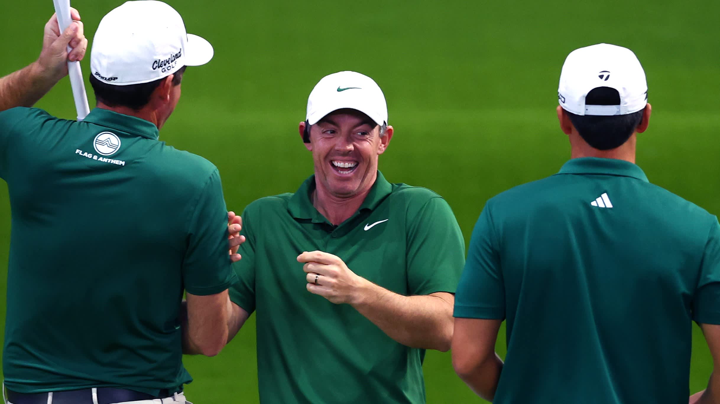 Rory McIlroy celebrates with Boston Common Golf teammates during the 2026 TGL season