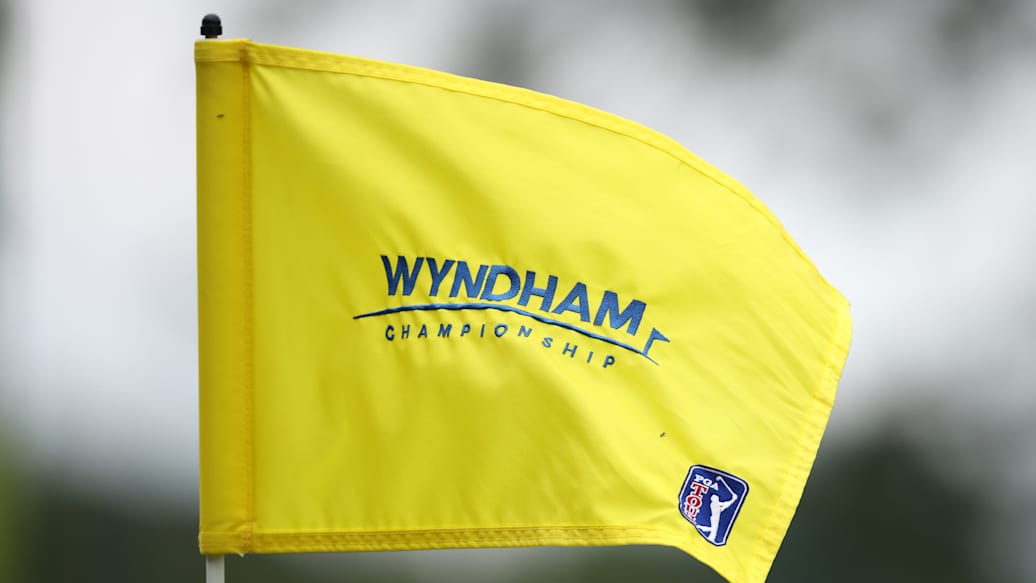 Golfer driving off the tee at Sedgefield Country Club during the Wyndham Championship opening round.