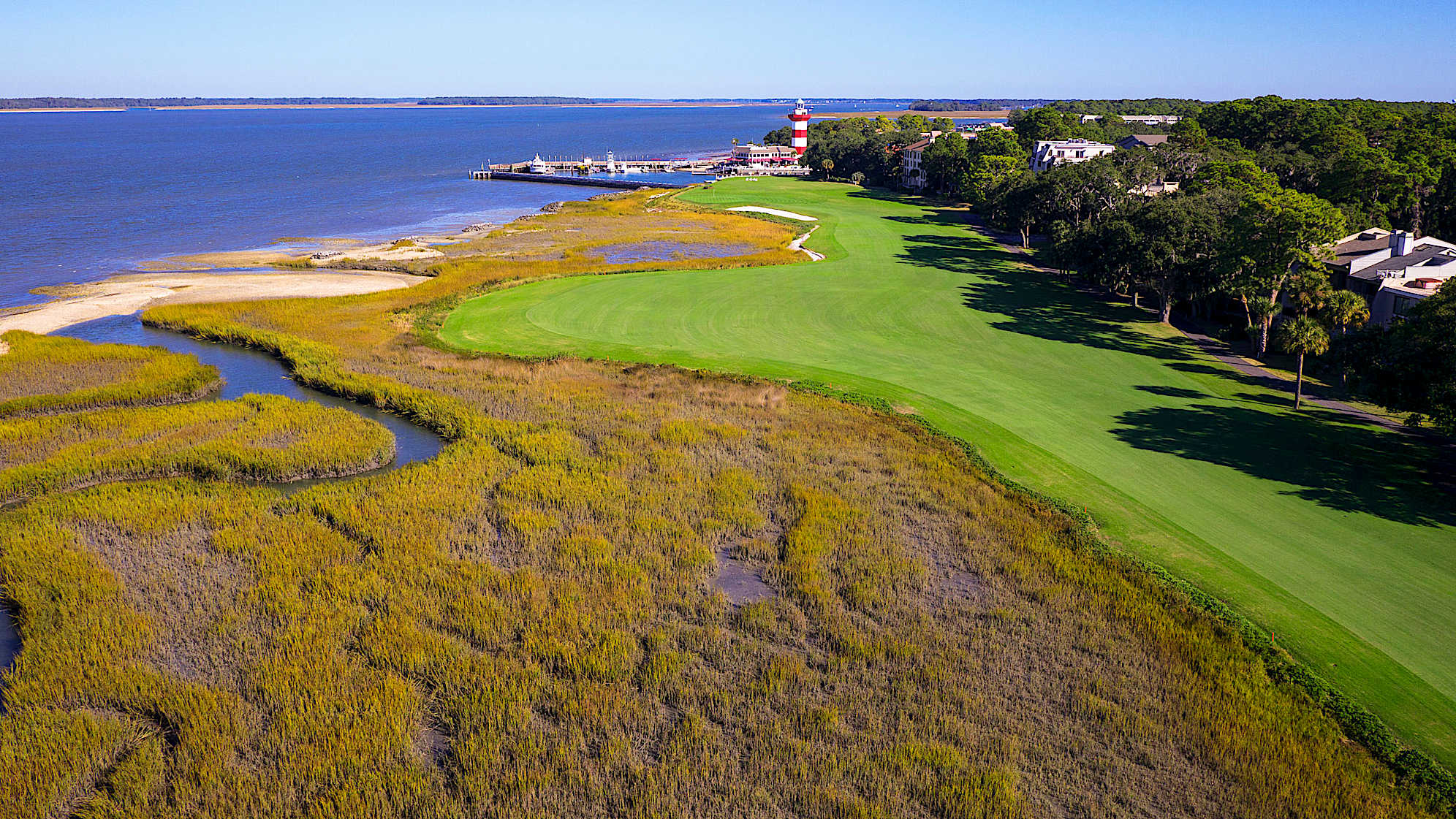 In this emerald-hued finale, the famous lighthouse becomes a beacon to landlubbers. A successful shot is one aimed toward the cherished landmark. The goal is the wide landing area jutting into Calibogue Sound. A word of advice on one of golf's most spectacular finishing holes: the long approach to the flag offers ample bailout to the right where the innocent-looking but insidious mounding has caused many want-to-be champs to lose a sought-after par.