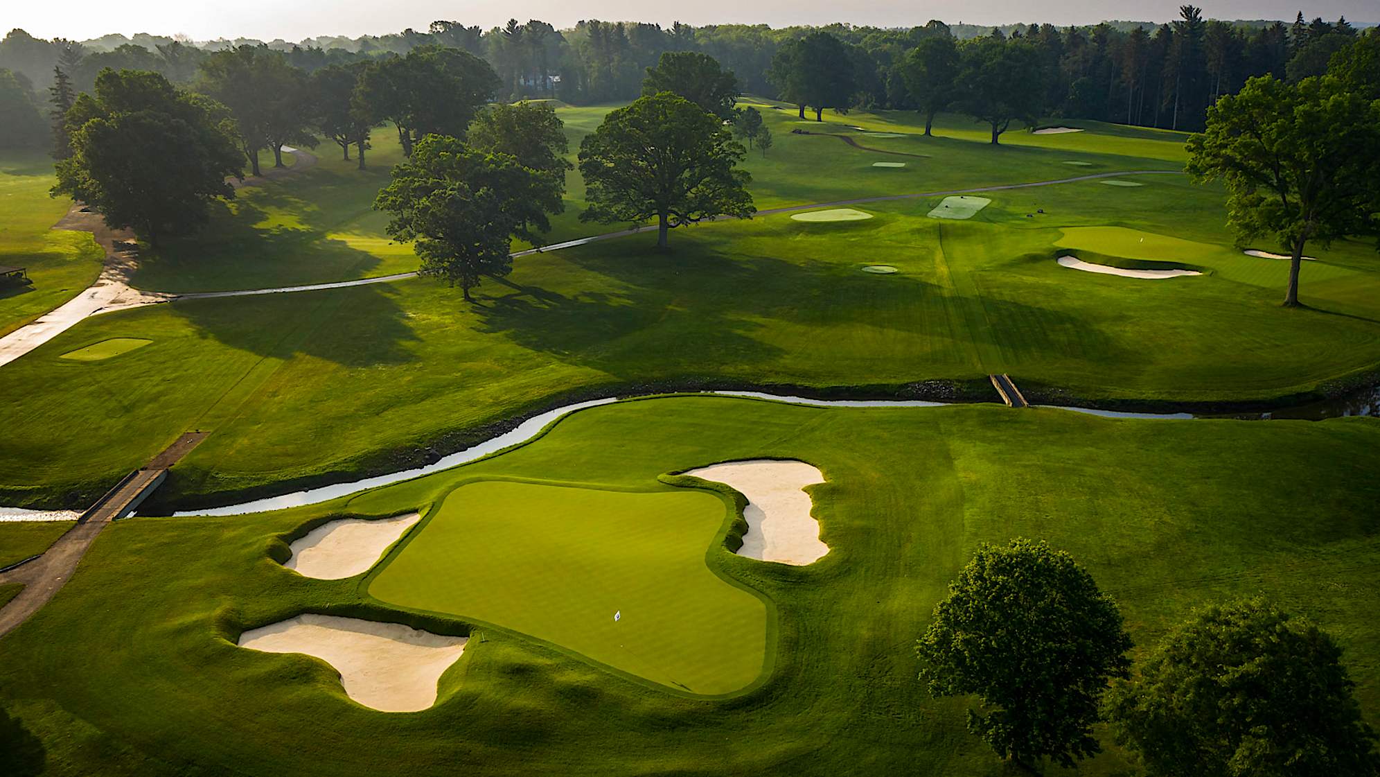 This long par 3 is surrounded by three greenside bunkers, one short-left and two long right, along with Allens Creek protecting the front right hole location. A large green offers a variety of hole locations which forces the player to be precise in their plan of attack; this can be a tall order from 245 yards. (Source: PGA of America)