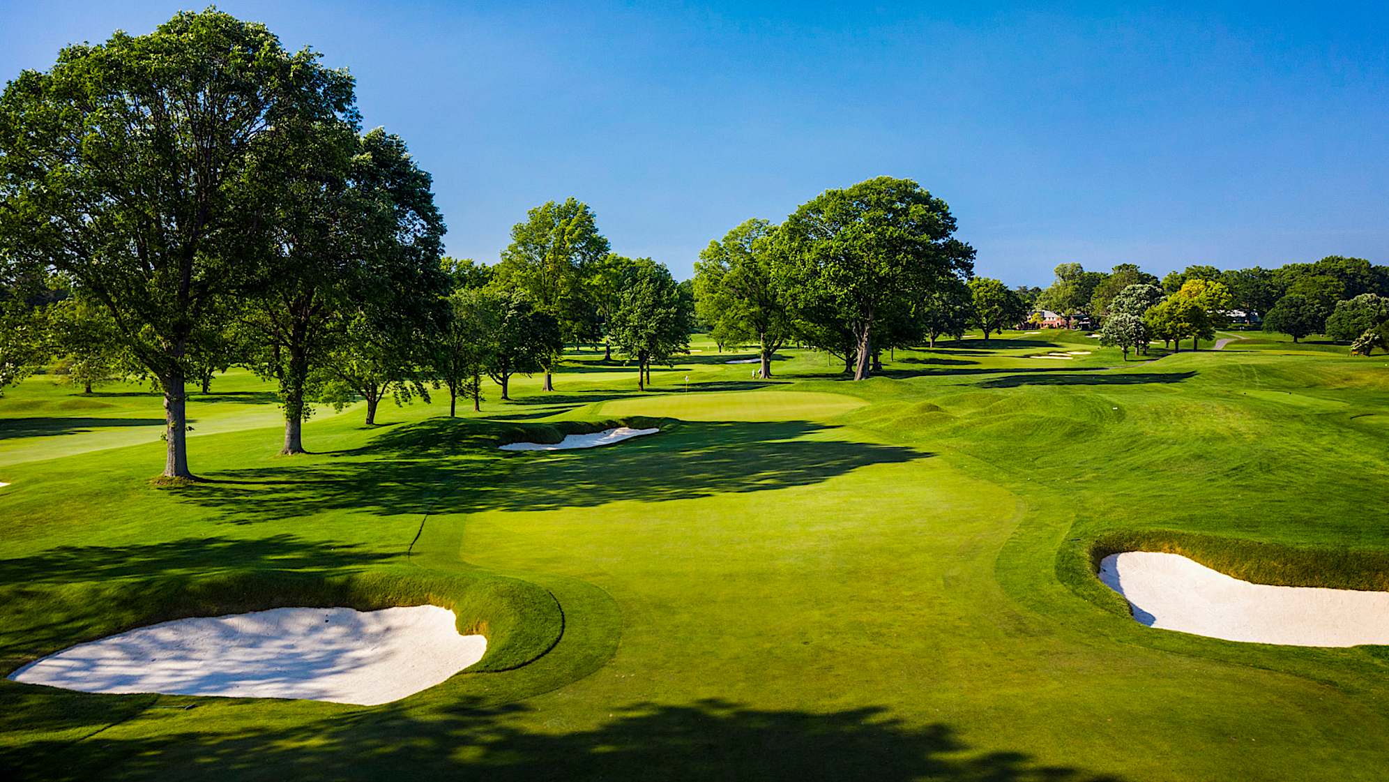 A par 5 for the membership becomes a long par 4 for the Championship. The tee shot must go at least 280 to provide a full view of the green. Errant tee shots right will provide serious trouble for the players looking for a birdie coming down the stretch. An undulated green will force players to be precise with their landing spots depending on the hole location. A miss long left will send the ball away from the green, challenging the player with a tough shot from a tight lie. (Source: PGA of America)