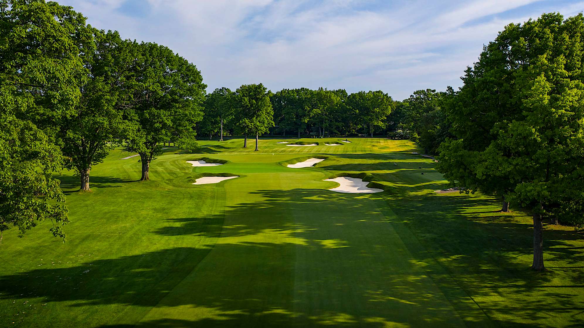 The only par 5 on the front requires a very precise tee shot to have a chance of reaching the green in two. Bunkers and out of bounds guard the right side while trees run along the left. The green slopes from back to front with deep bunkers short-left and short-right guarding the green. (Source: PGA of America)