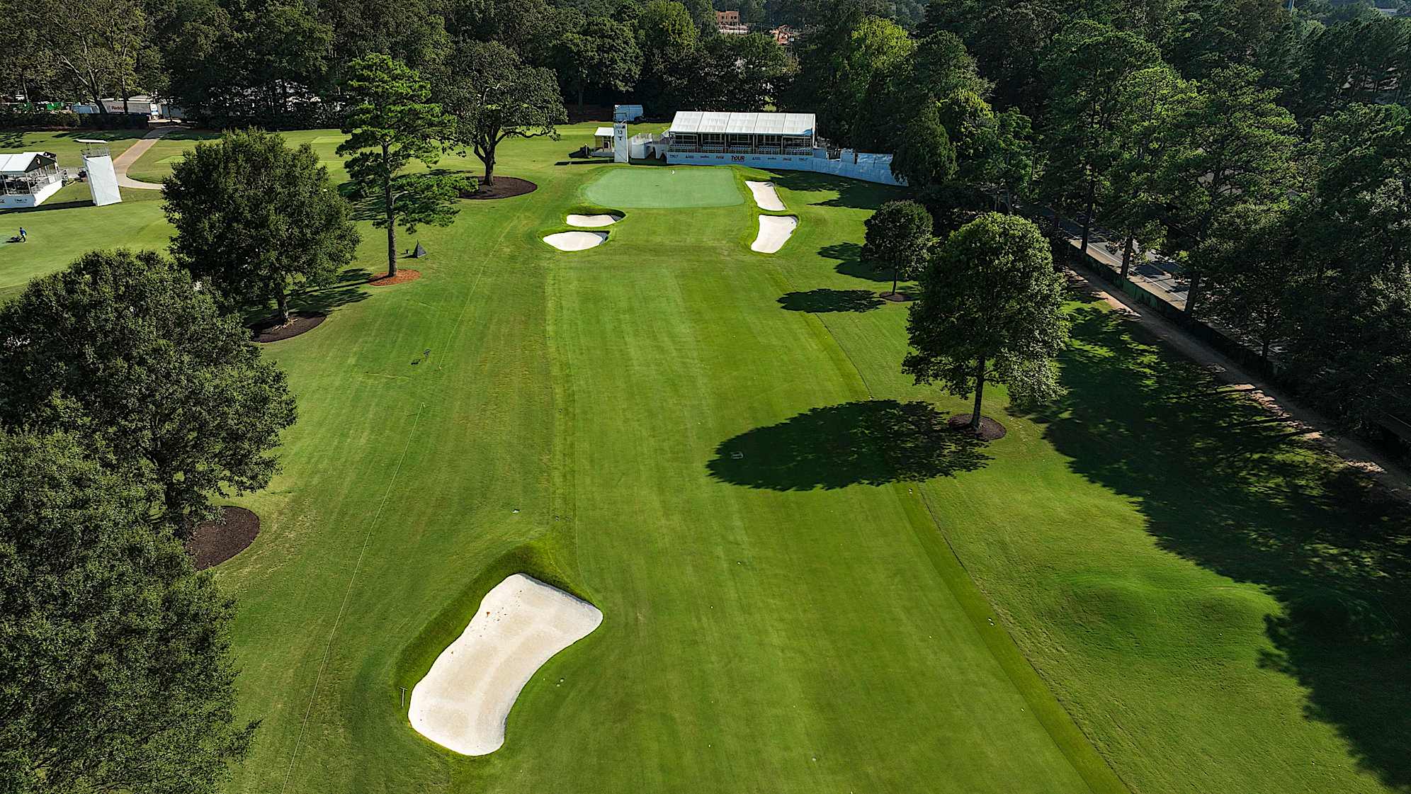 ATLANTA, GEORGIA - AUGUST 25: (EDITOR’S NOTE: Image taken with a drone.) An aerial view of the 13th hole prior to TOUR Championship at East Lake Golf Club on August 25, 2024 in Atlanta, Georgia. (Photo by Chris Condon/PGA TOUR)