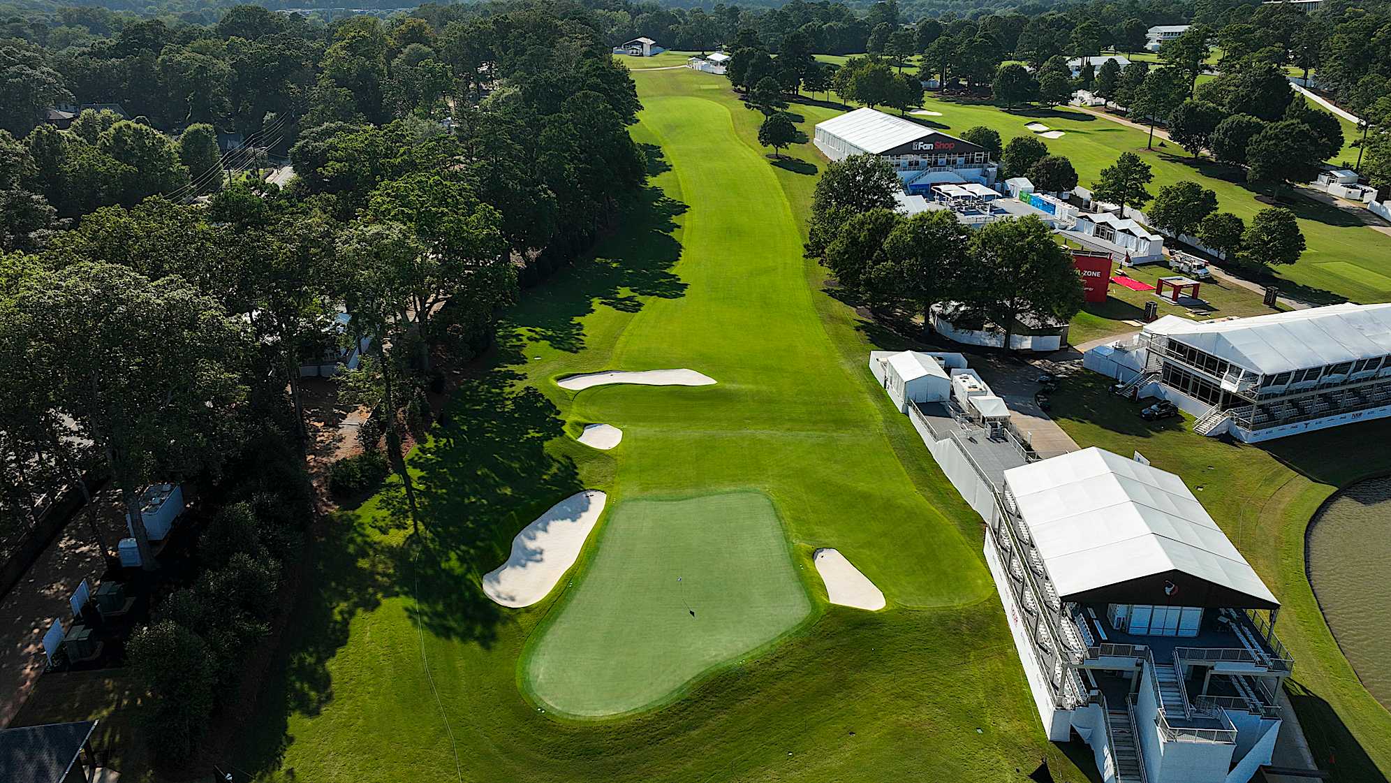 ATLANTA, GEORGIA - AUGUST 25: (EDITOR’S NOTE: Image taken with a drone.) An aerial view of the 14th hole prior to TOUR Championship at East Lake Golf Club on August 25, 2024 in Atlanta, Georgia. (Photo by Chris Condon/PGA TOUR)