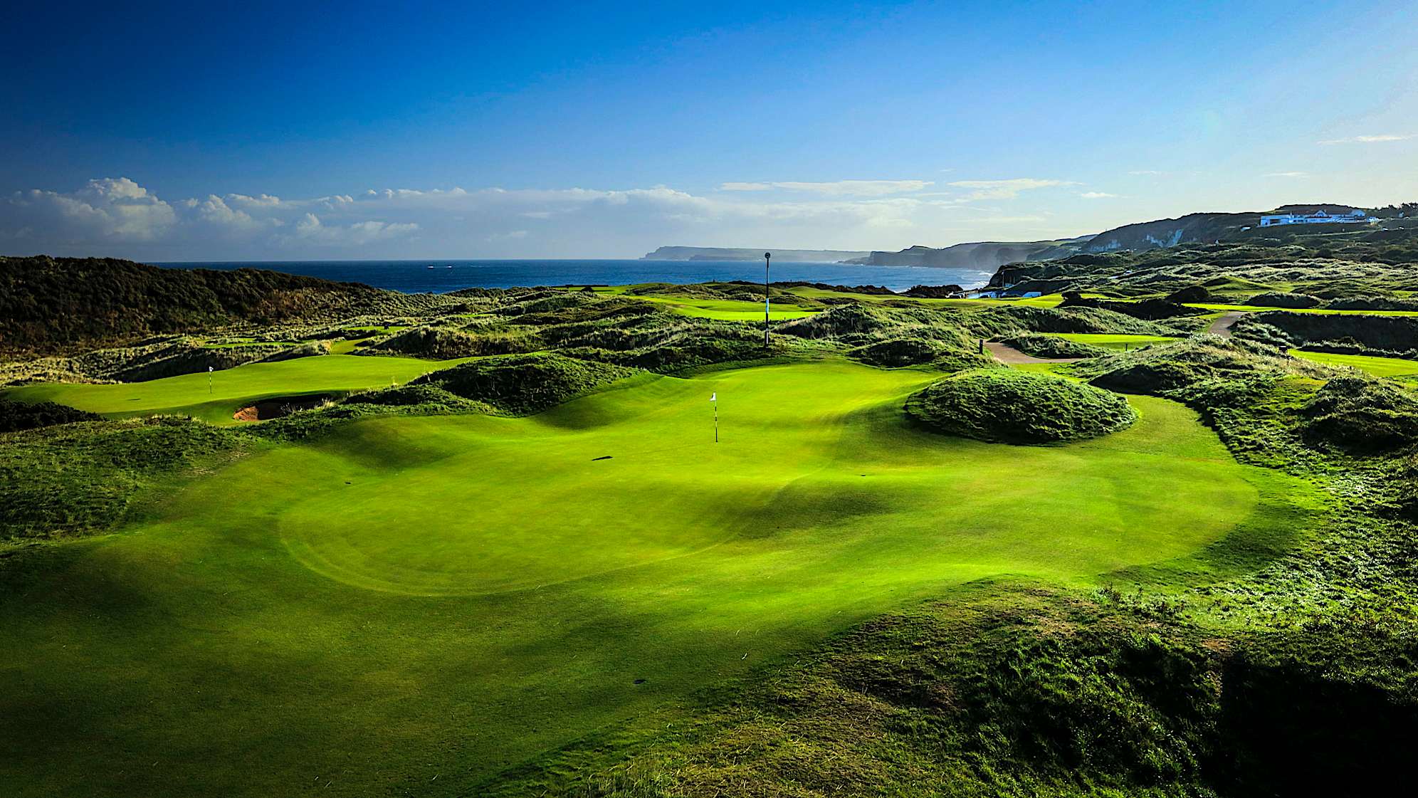 HIMALAYAS: A strong tee shot is required to find the corner of the sharp dogleg 10th fairway for an unobstructed view towards the green. There are no bunkers on this hole – they’re not needed with dramatic contours in play for both the tee and approach shots. New contours have also been added to a very long and narrow green to improve its definition and character. (Descriptions courtesy of the R&A)
