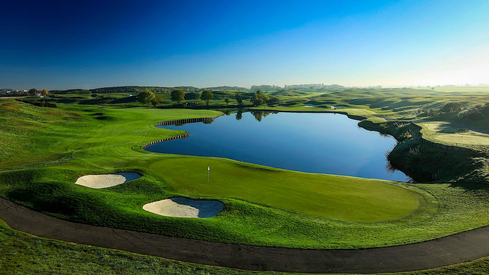Right from the start of the first hole, the tee shot is crucial. You don’t have many options and a 2 iron or a 3 wood should keep you out of trouble. You will be left with a mid to short iron to the green, but you will need to be accurate, especially with a pin position just a few yards away from the water and some bunkers around the newly shortened green. (Source: PGA of America)