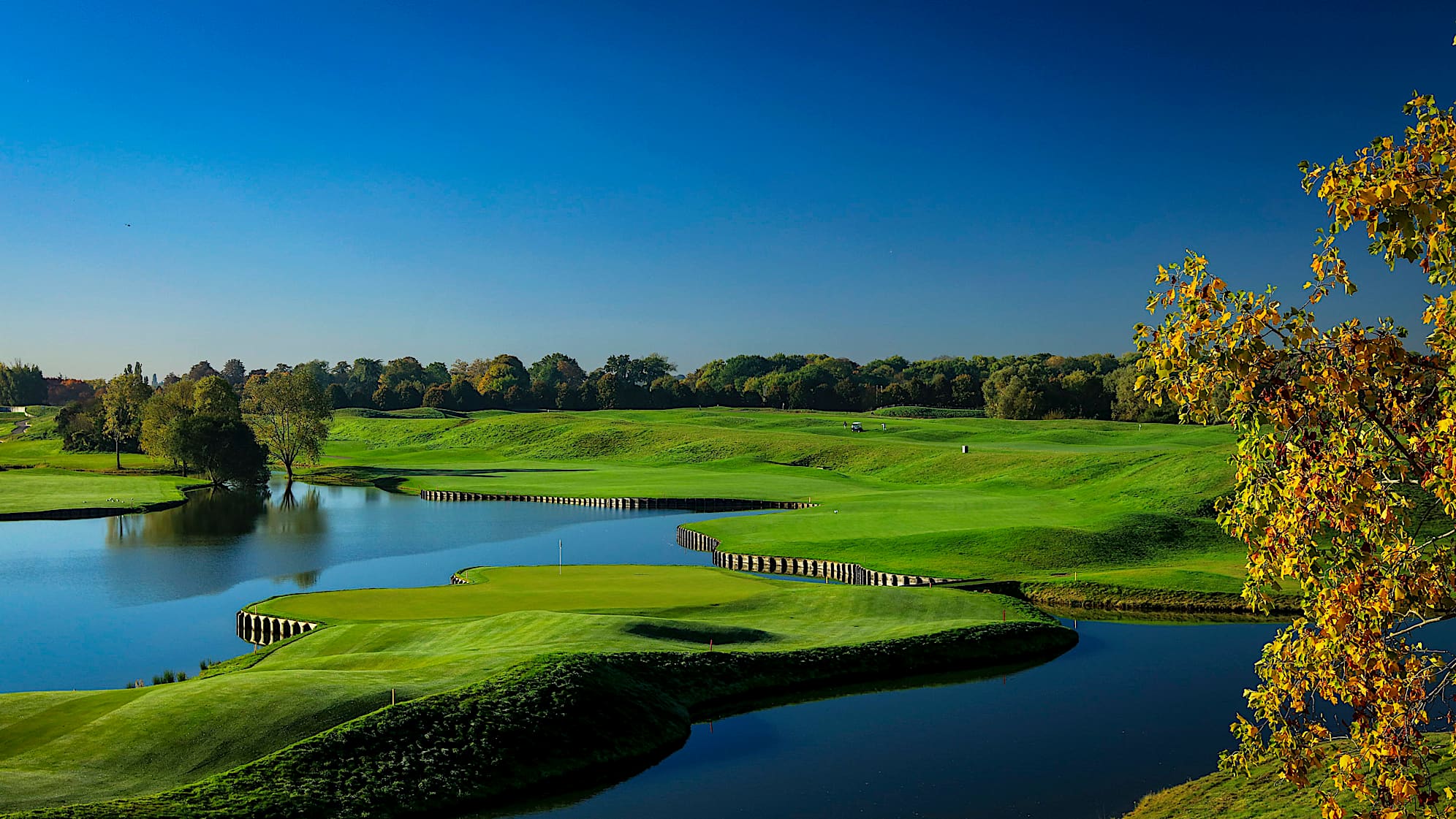 The last four holes are where the real drama gets started. Though its length is modest, this hole remains a dangerous one. Approaching the clubhouse, the water surrounding the green, combined with a tricky pin position, could trip some players up. (Source: PGA of America)