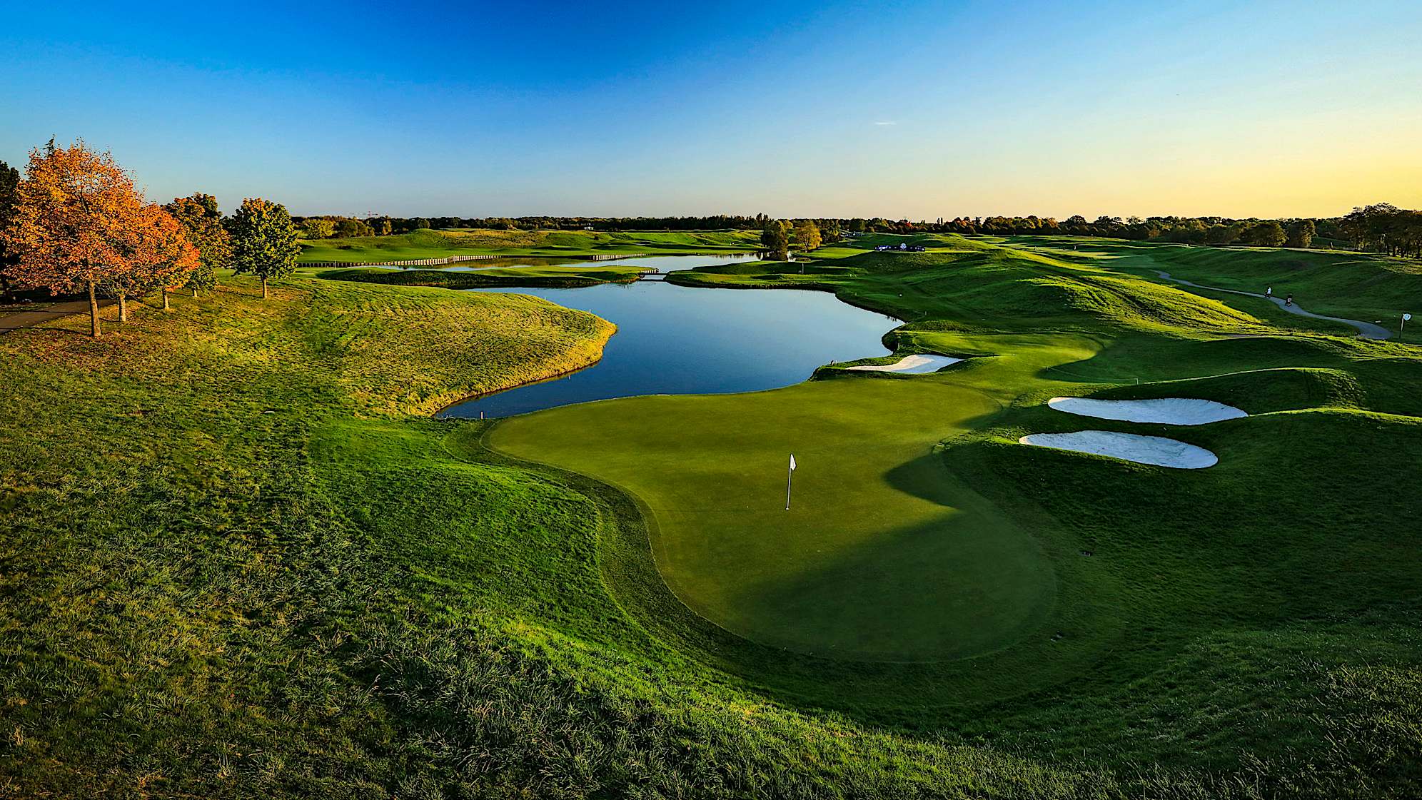 The difficulty of this green lies in the undulations that tempt balls into the water, protecting the green on its right. Aiming for the left side of this par 3's green, players will be left with an uncomfortable downhill putt. (Source: PGA of America)