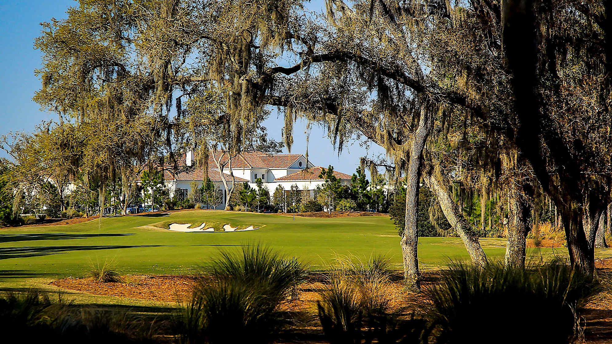 Playing safely to the left of the large oak trees leaves you facing a long second shot to the green. Driving over the oaks to the middle of the fairway will reward you with a much shorter second shot. A deep bunker protects the left side of the elevated green.