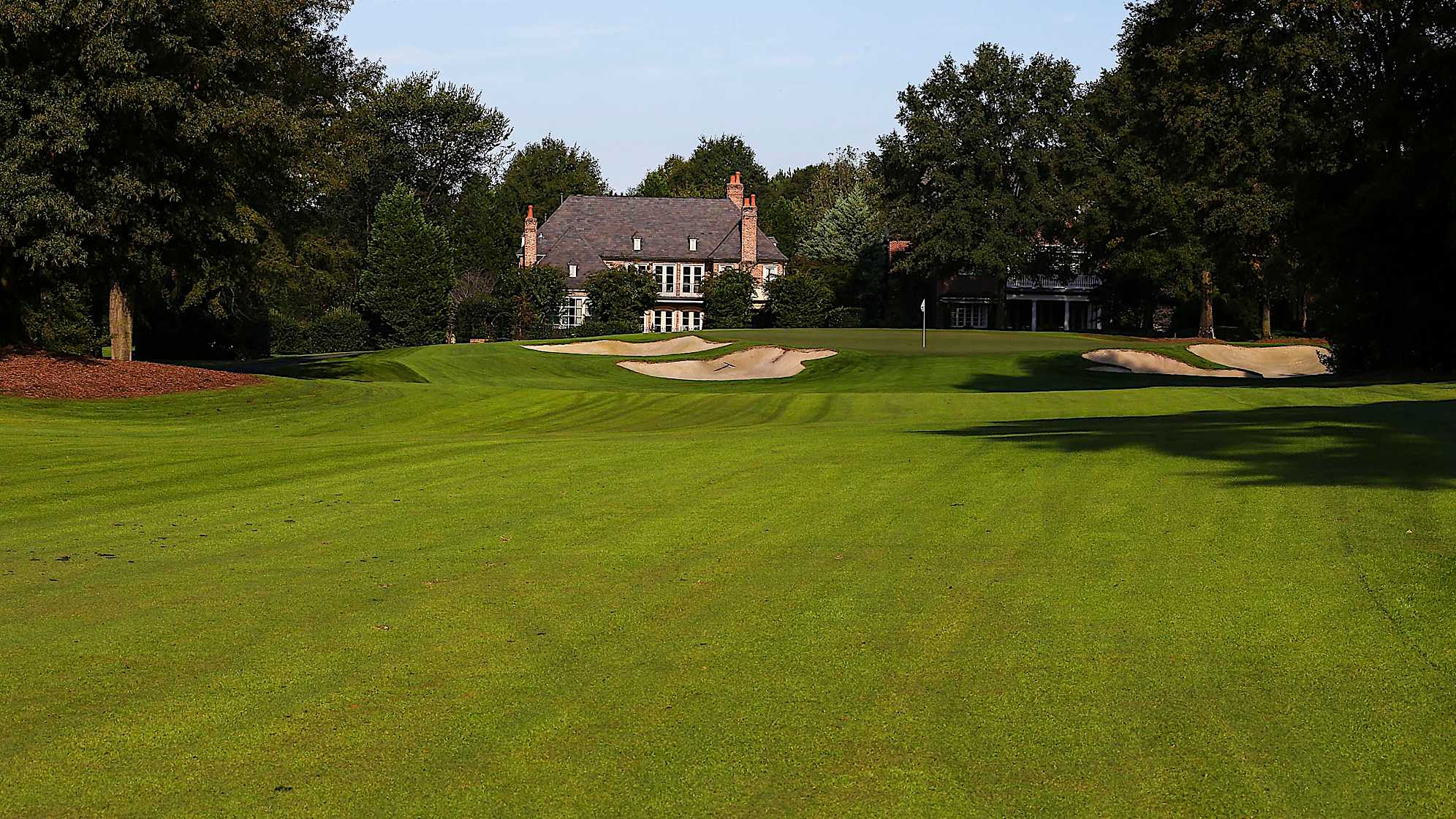 The fourth hole is a troublesome par 4 that requires a long, accurate tee shot. A new teeing ground was added in 2009 that stretches the hole to almost 490 yards.The green on Quail Hollow's signature 17th hole is nearly an island, forcing a 200-yard carry to clear the water. A fade is also required to settle the ball on a precariously perched, back-to-front and right-to-left sloping green. Enjoy the birdie-or-blunder potential this hole presents, as well as the view of the lake stretched out behind the green. (PGA TOUR)