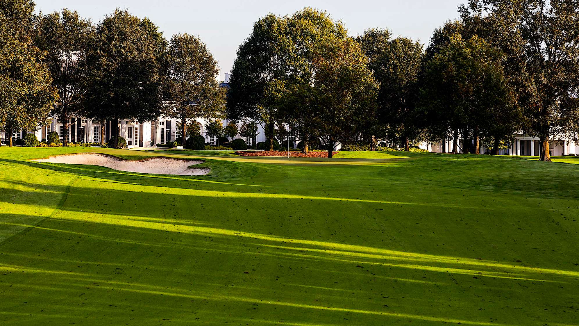 The ninth hole is not only the longest par 4 at Quail Hollow, but may also be the toughest. The bunker on the right is very much in play and uphill second shots require a long iron or fairway wood. The medium-sized green has plenty of movement and many hole placement options. Players must avoid the bunker left and tree right.The green on Quail Hollow's signature 17th hole is nearly an island, forcing a 200-yard carry to clear the water. A fade is also required to settle the ball on a precariously perched, back-to-front and right-to-left sloping green. Enjoy the birdie-or-blunder potential this hole presents, as well as the view of the lake stretched out behind the green. (PGA TOUR)