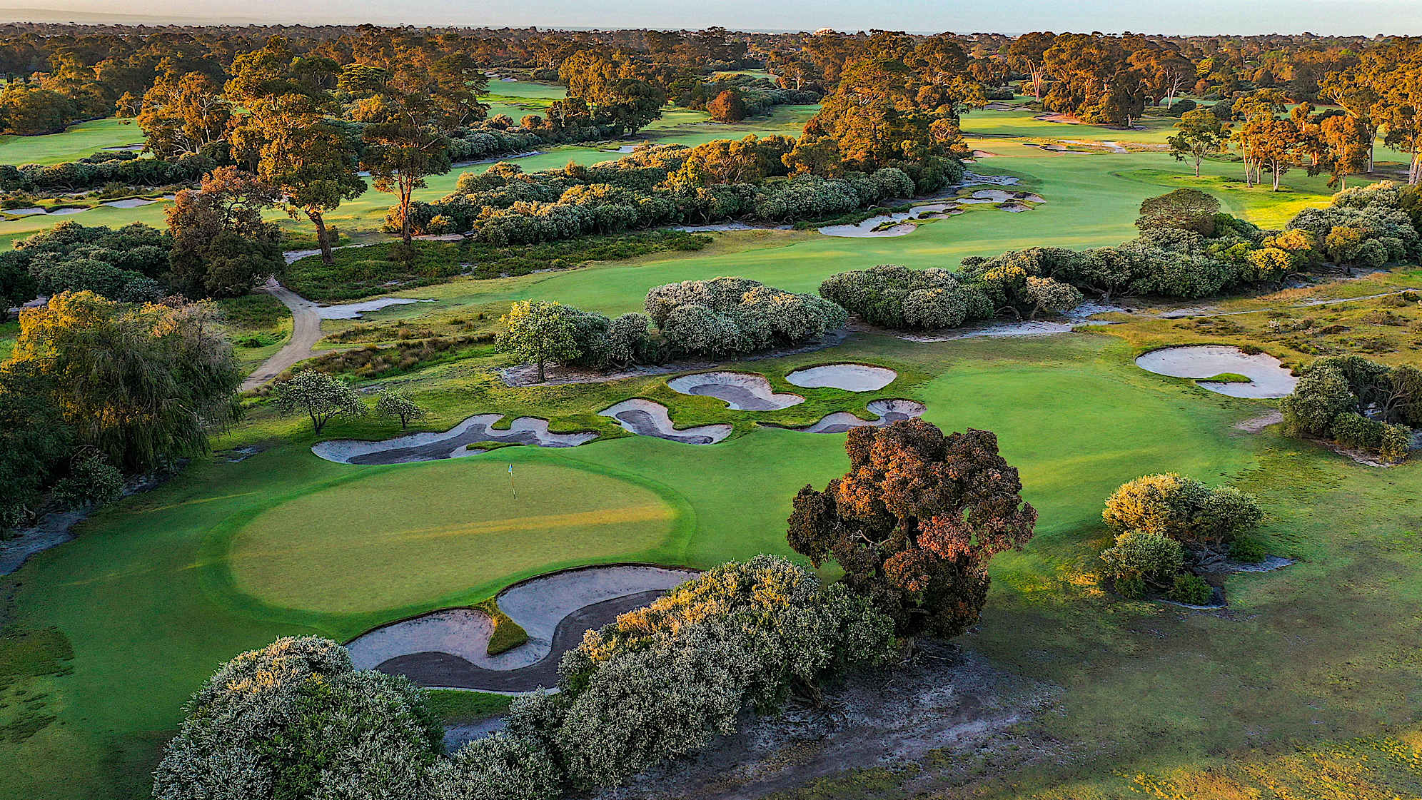 Hole 5: Par 3, 173 meters (2028 Presidents Cup Hole No. 3)  Although this is the longest par three on the course, it is a fairly straightforward hole. There are plenty of sand traps on both sides, but the size of the green provides reasonable margin for error off the tee.