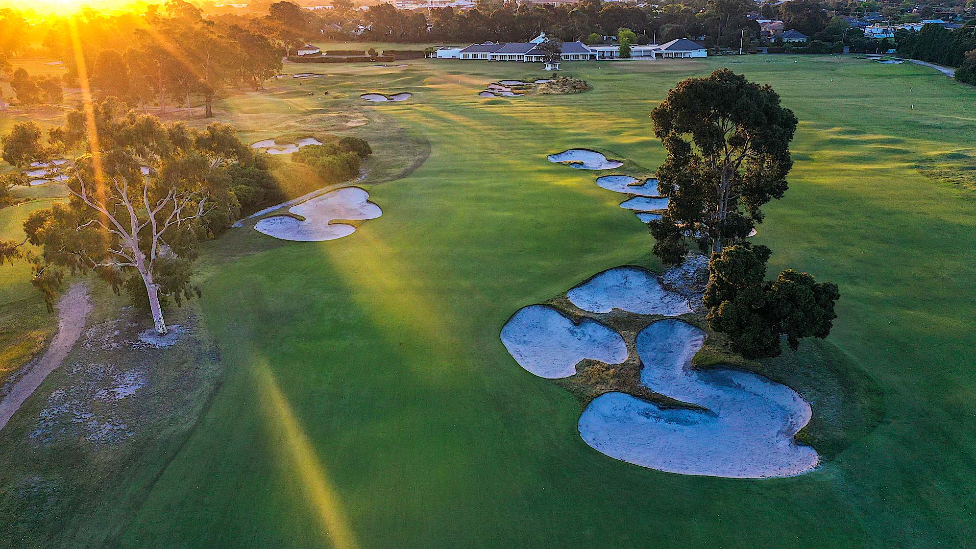 Hole 6: Par 4, 393 meters (2028 Presidents Cup Hole No. 18)  A difficult par four requiring a long drive and a long second shot. A string of bunkers waits to snare any approach straying right, although the area around the green itself is fairly clear.