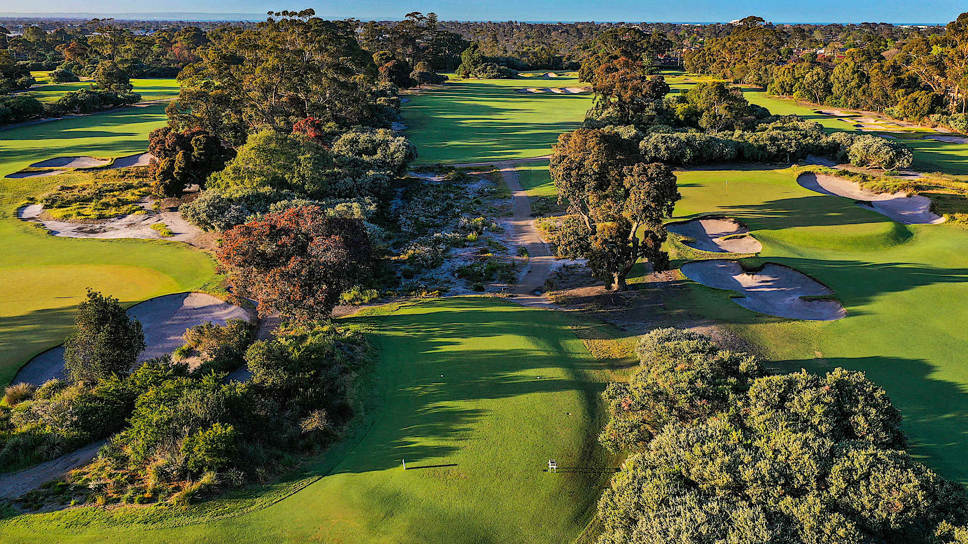Hole 8: Par 4, 398 meters (2028 Presidents Cup Hole No. 13)  Another long par four requiring placement off the tee. The drive must be kept left to open up the green and avoid fairway traps and rough on the corner of the dogleg. The green is severely bunkered on the left.
