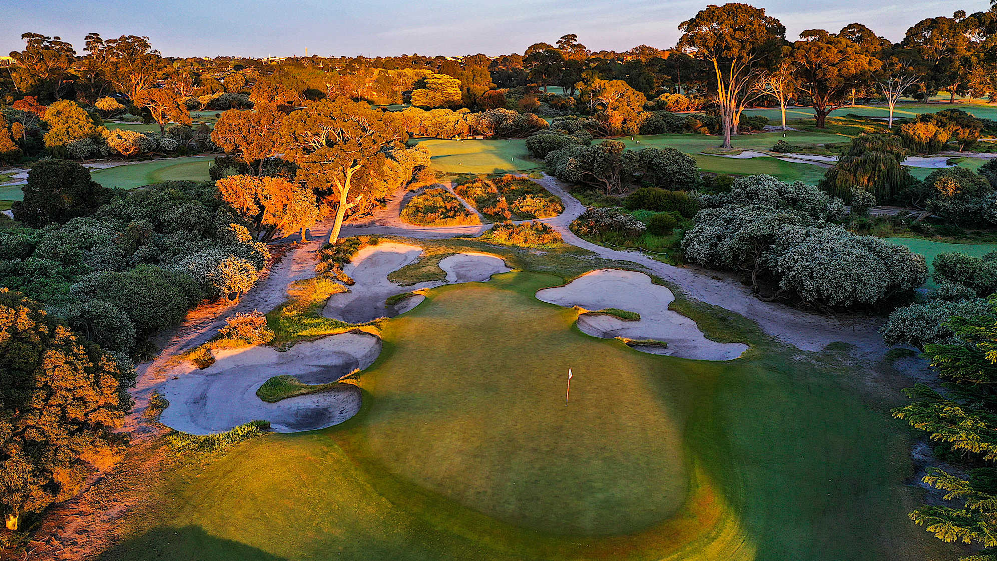 Hole 10: Par 3, 128 meters (Out of play for the 2028 Presidents Cup)  There often are many birdies on this short hole, but any misdirected shots will finish in either heavy rough or one of the numerous bunkers which surround the green.