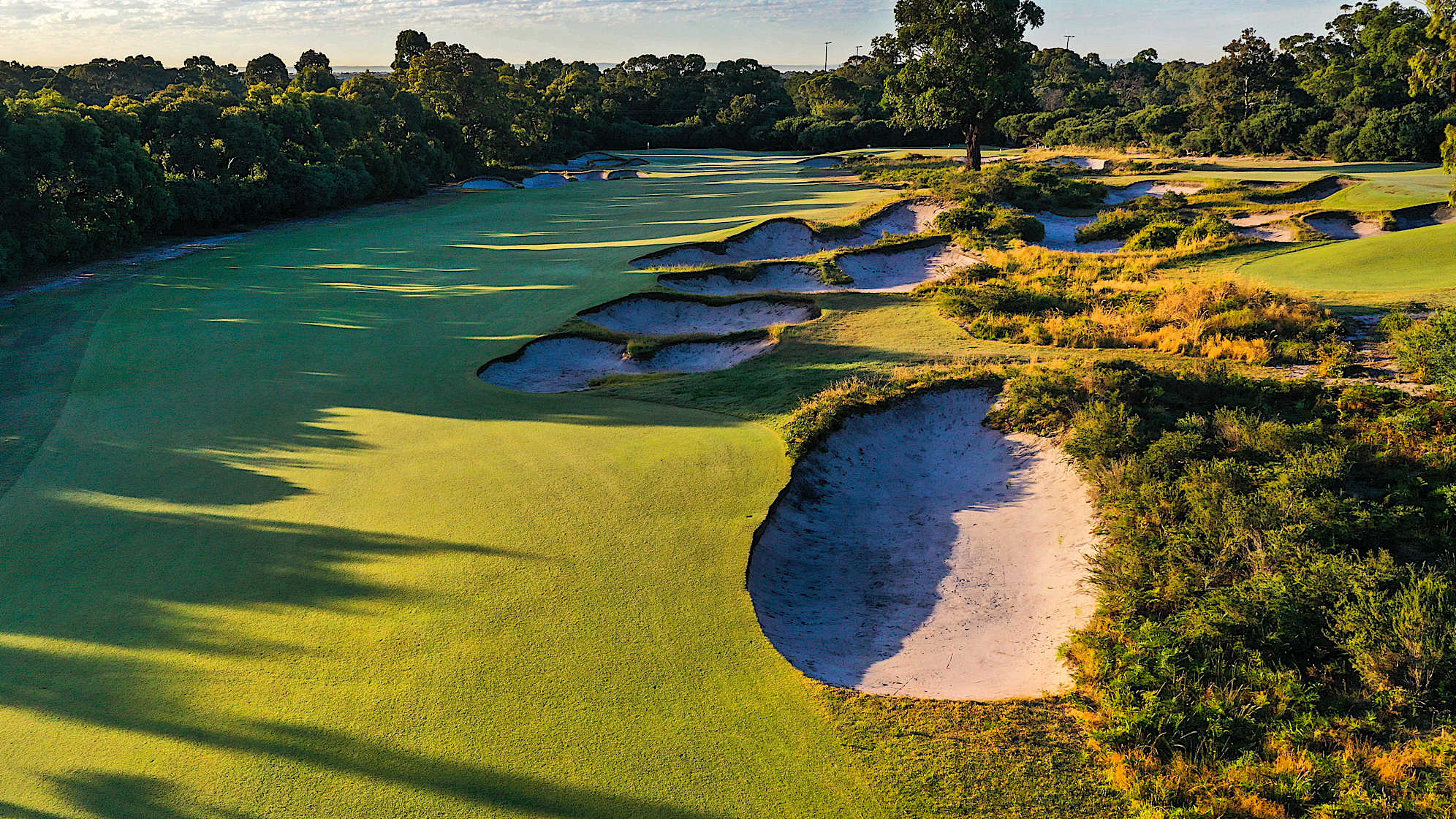 Hole 14: Par 5, 515 meters (2028 Presidents Cup Hole No. 6)  The longest hole, where birdies will be scarce. Bunkers 45 metres short of the green leave little opening for long hitters attempt to get close in two. An out of bounds left and behind the green provides an additional mental hazard.