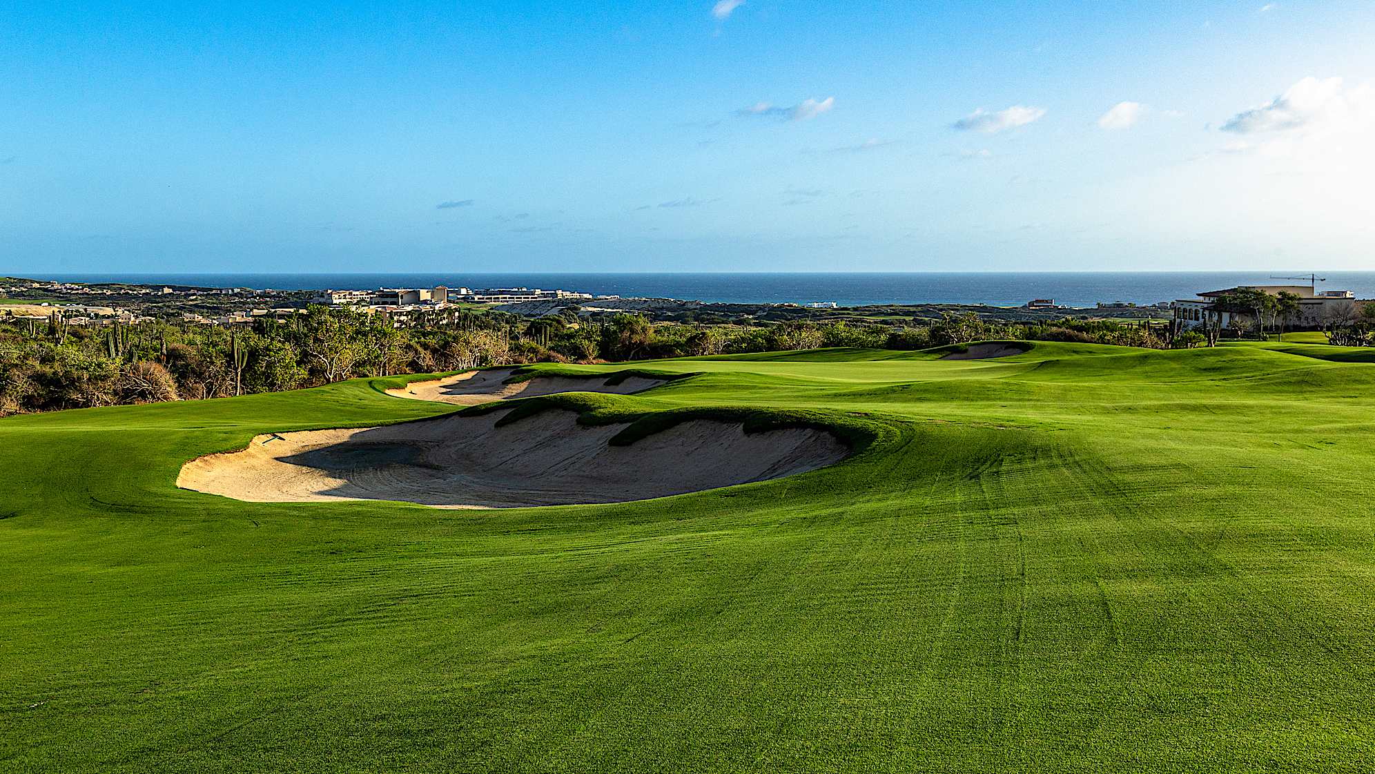 This mid-length par 3 plays slightly downhill. Golfers can choose to carry the green or use the feeder slope for an approach shot played short. Accurate yardage control is crucial, as missing the green long and right may result in a challenging recovery from a deep pot bunker. Subtle undulations on the green pose challenges for putting.
