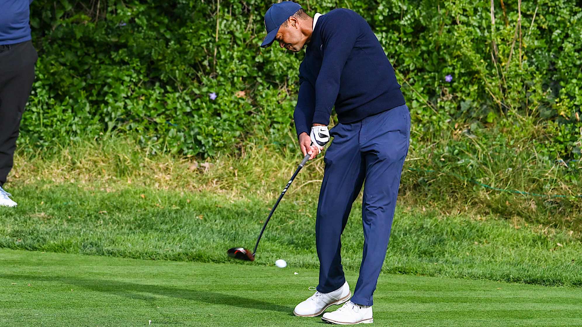 PACIFIC PALISADES, CA - FEBRUARY 16:  Tiger Woods at impact as he plays his shot from the 13th hole tee during the first round of the Genesis Invitational at Riviera Country Club on February 16, 2023 in Pacific Palisades, California. (Photo by Keyur Khamar/PGA TOUR via Getty Images)