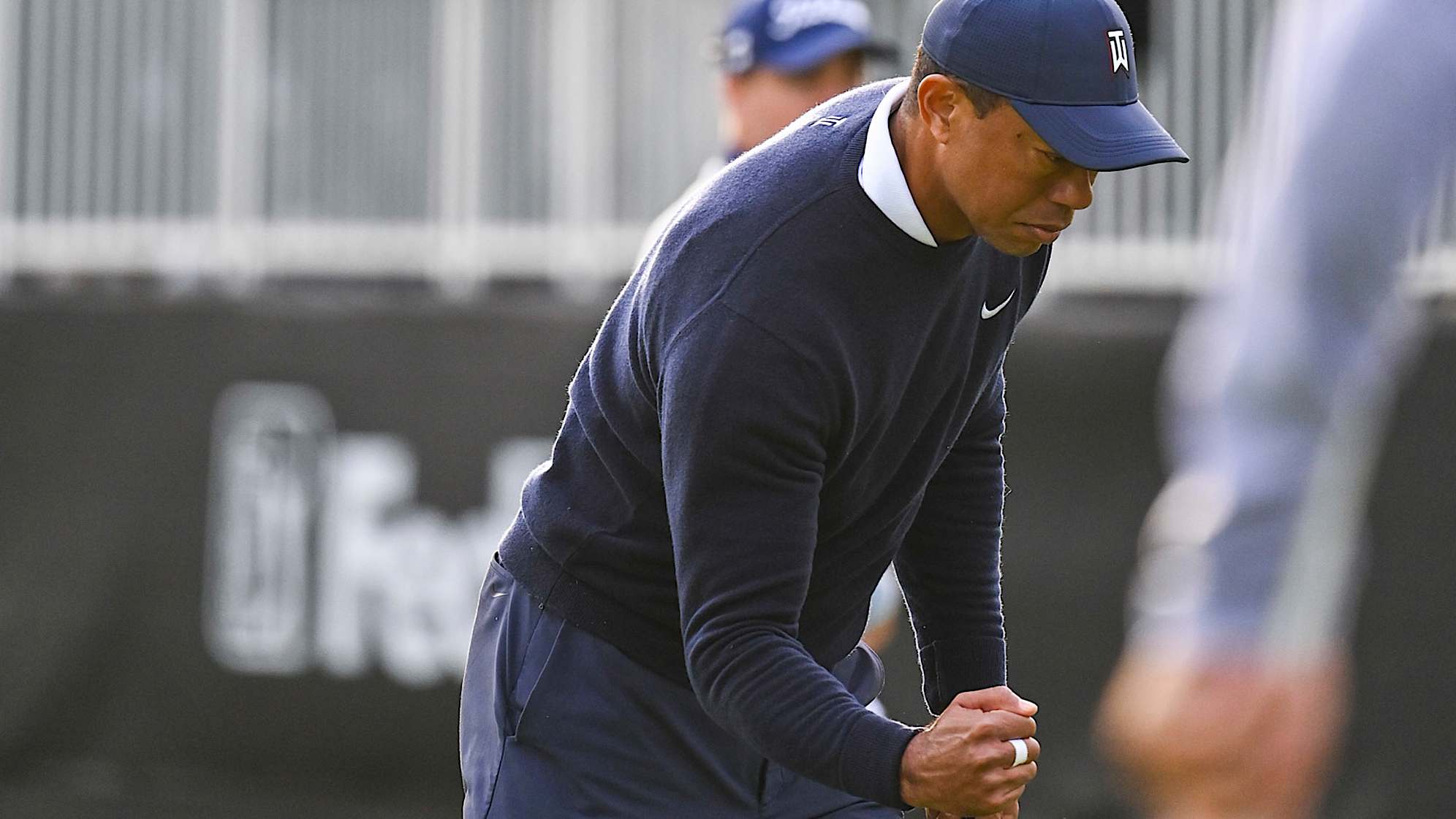 PACIFIC PALISADES, CA - FEBRUARY 16:  Tiger Woods celebrates with a fist pump after making a birdie putt on the 17th hole green during the first round of the Genesis Invitational at Riviera Country Club on February 16, 2023 in Pacific Palisades, California. (Photo by Keyur Khamar/PGA TOUR via Getty Images)