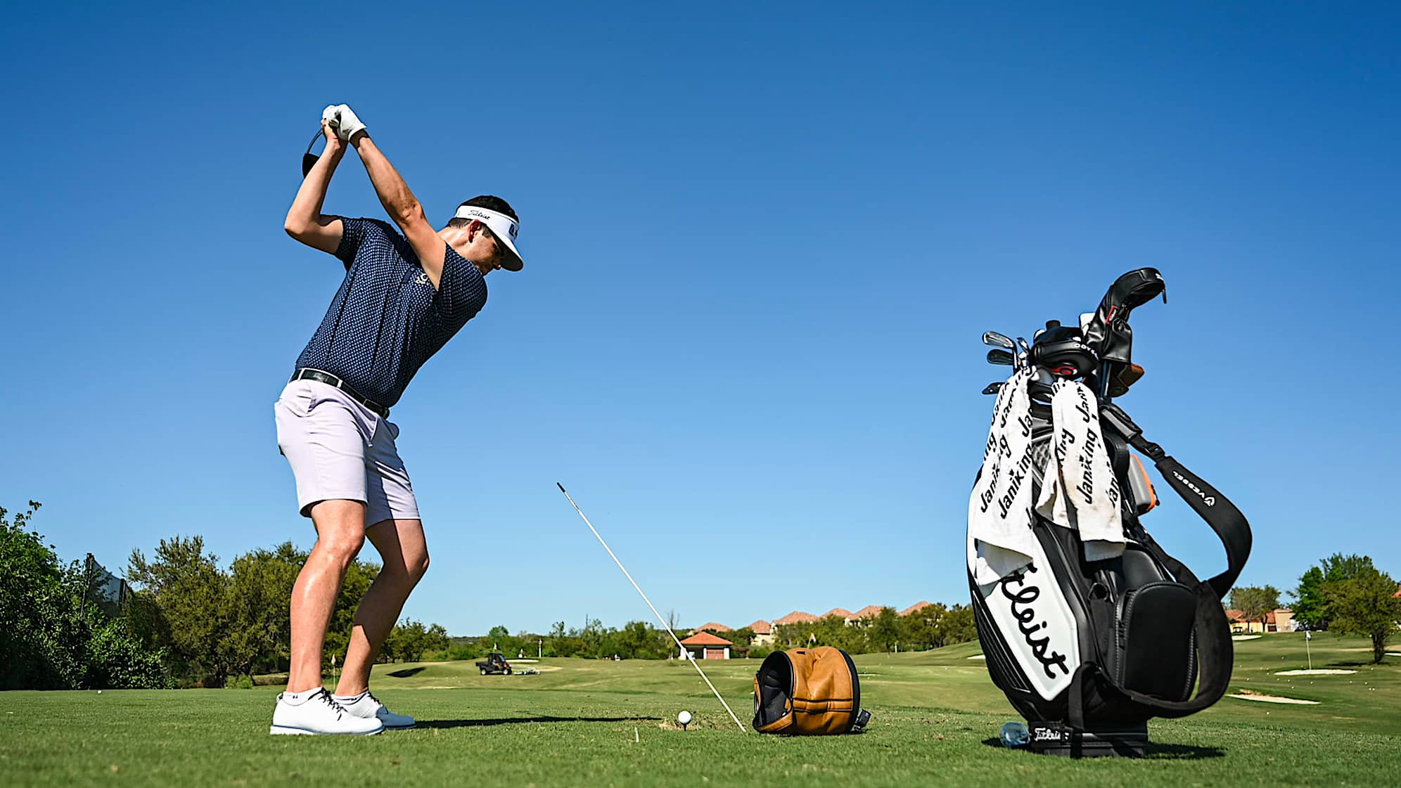 AUSTIN, TX - MARCH 25: Beau Hossler hits a driver past an alignment rod at the practice facility at the University of Texas (UT) Golf Club on March 25, 2023 in Austin, Texas. (Photo by Keyur Khamar/PGA TOUR via Getty Images)