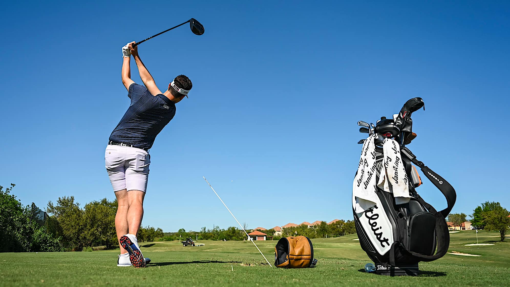 AUSTIN, TX - MARCH 25: Beau Hossler hits a driver past an alignment rod at the practice facility at the University of Texas (UT) Golf Club on March 25, 2023 in Austin, Texas. (Photo by Keyur Khamar/PGA TOUR via Getty Images)