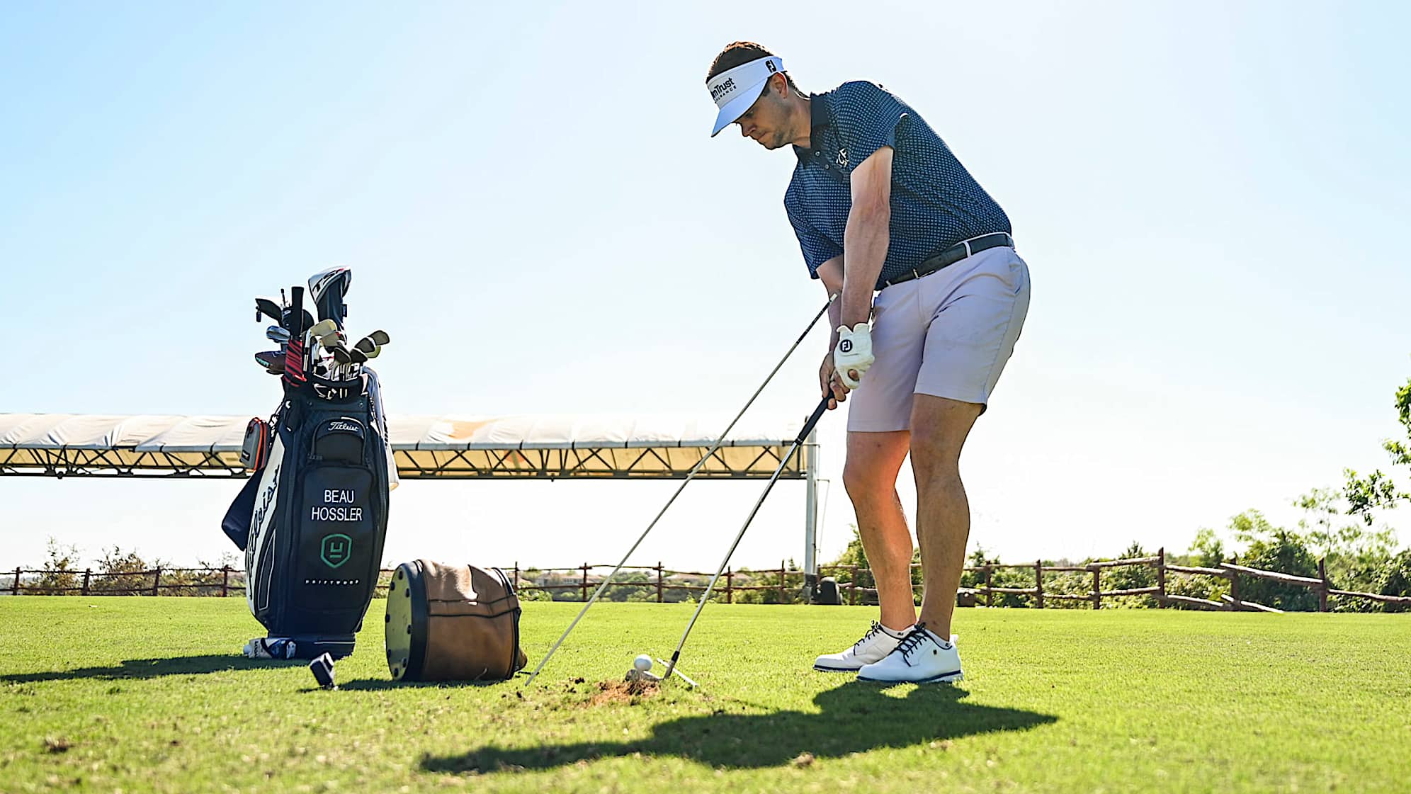 AUSTIN, TX - MARCH 25: Beau Hossler hits a wedge past an alignment rod at the practice facility at the University of Texas (UT) Golf Club on March 25, 2023 in Austin, Texas. (Photo by Keyur Khamar/PGA TOUR via Getty Images)