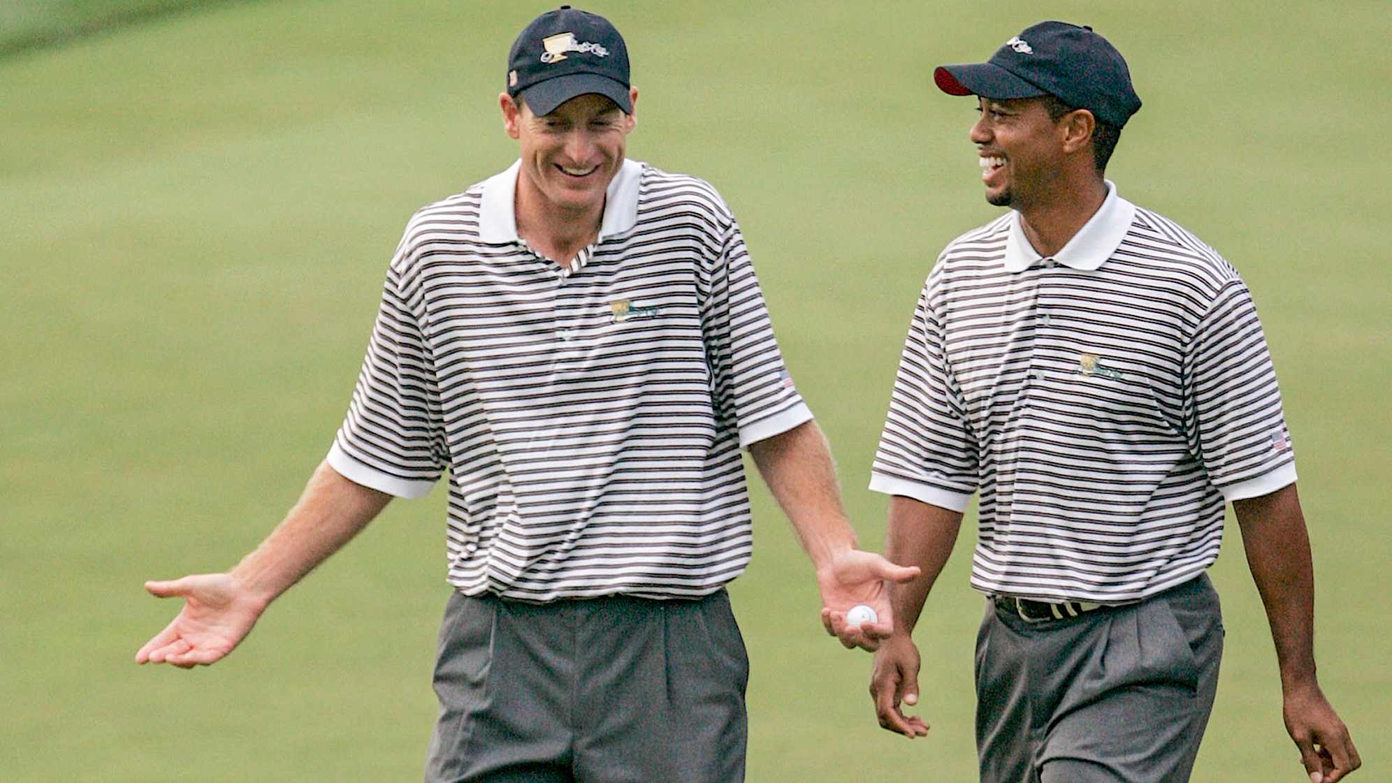 UNITED STATES - SEPTEMBER 23: Jim Furyk and Tiger Woods of the U.S. team during the second round of The Presidents Cup at Robert Trent Jones Golf Club in Prince William County, Virginia on September 23, 2005. (Photo by J Rogash/Getty Images)