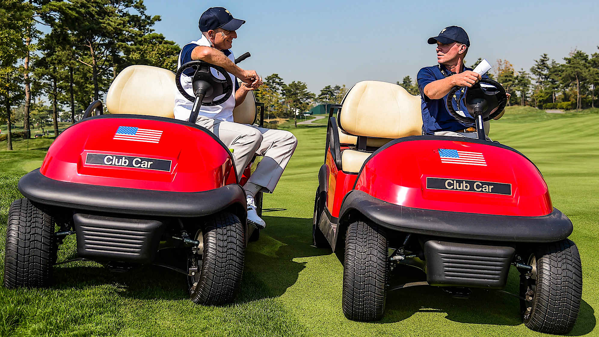 INCHEON CITY, SOUTH KOREA - OCTOBER 05: (L-R) Team USA Captain's Assistants Jim Furyk and Steve Stricker speak during practice for The Presidents Cup at Jack Nicklaus Golf Club Korea on October 5, 2015 in Songdo IBD, Incheon City, South Korea. (Photo by Chris Condon/PGA TOUR)