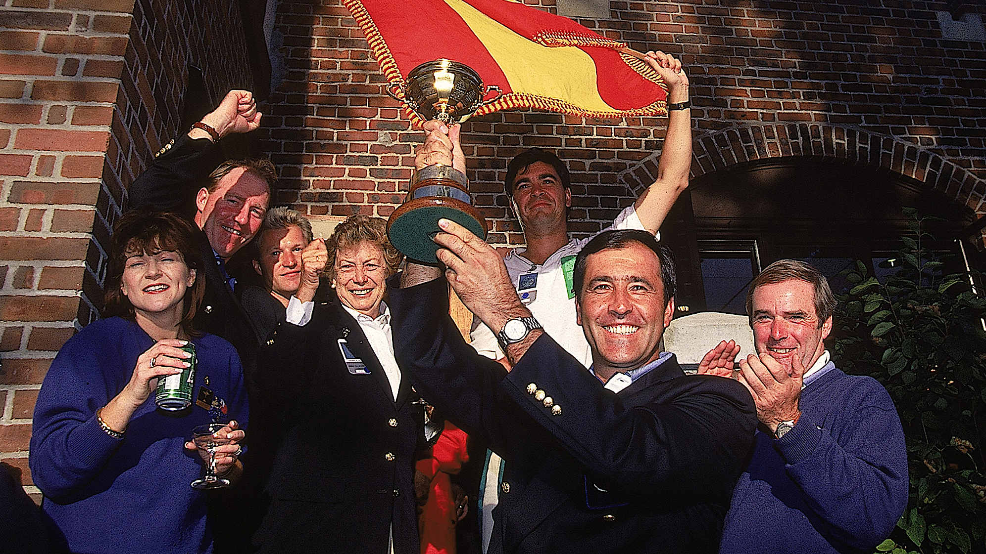 Seve Ballesteros hoists the trophy after Europe defeated the United States at the 1995 Ryder Cup at Oak Hill Country Club. (David Cannon/Getty Images)